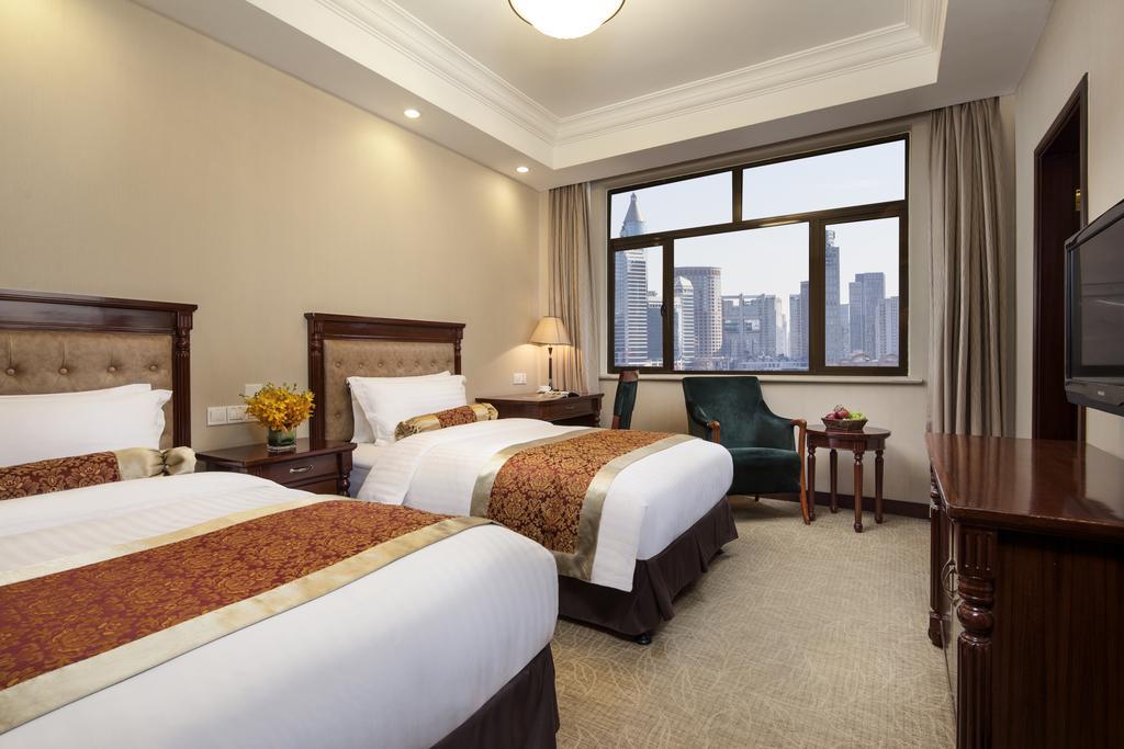 Jin Jiang Pacific Hotel Шанхай Екстер'єр фото