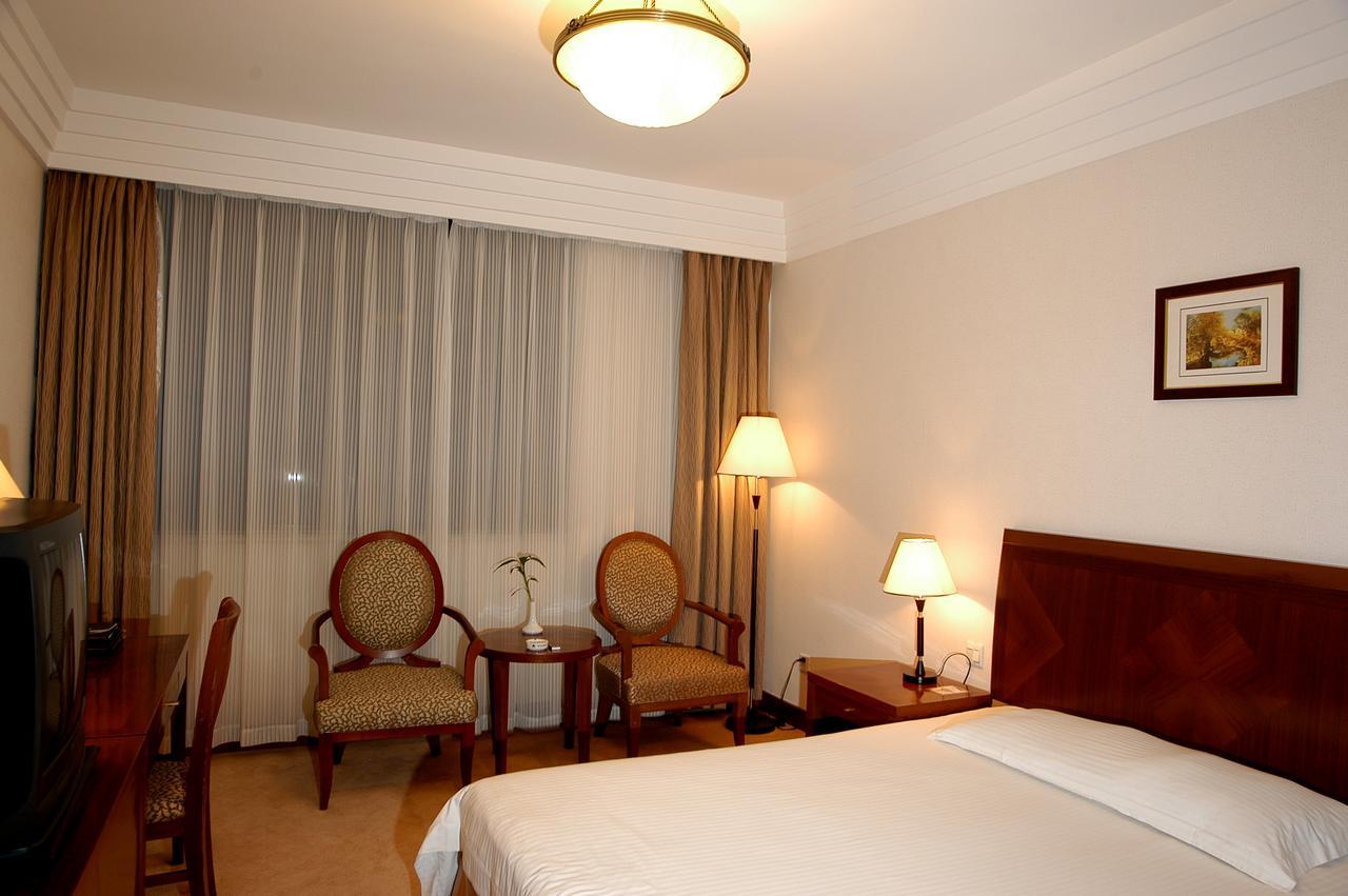 Jin Jiang Pacific Hotel Шанхай Номер фото